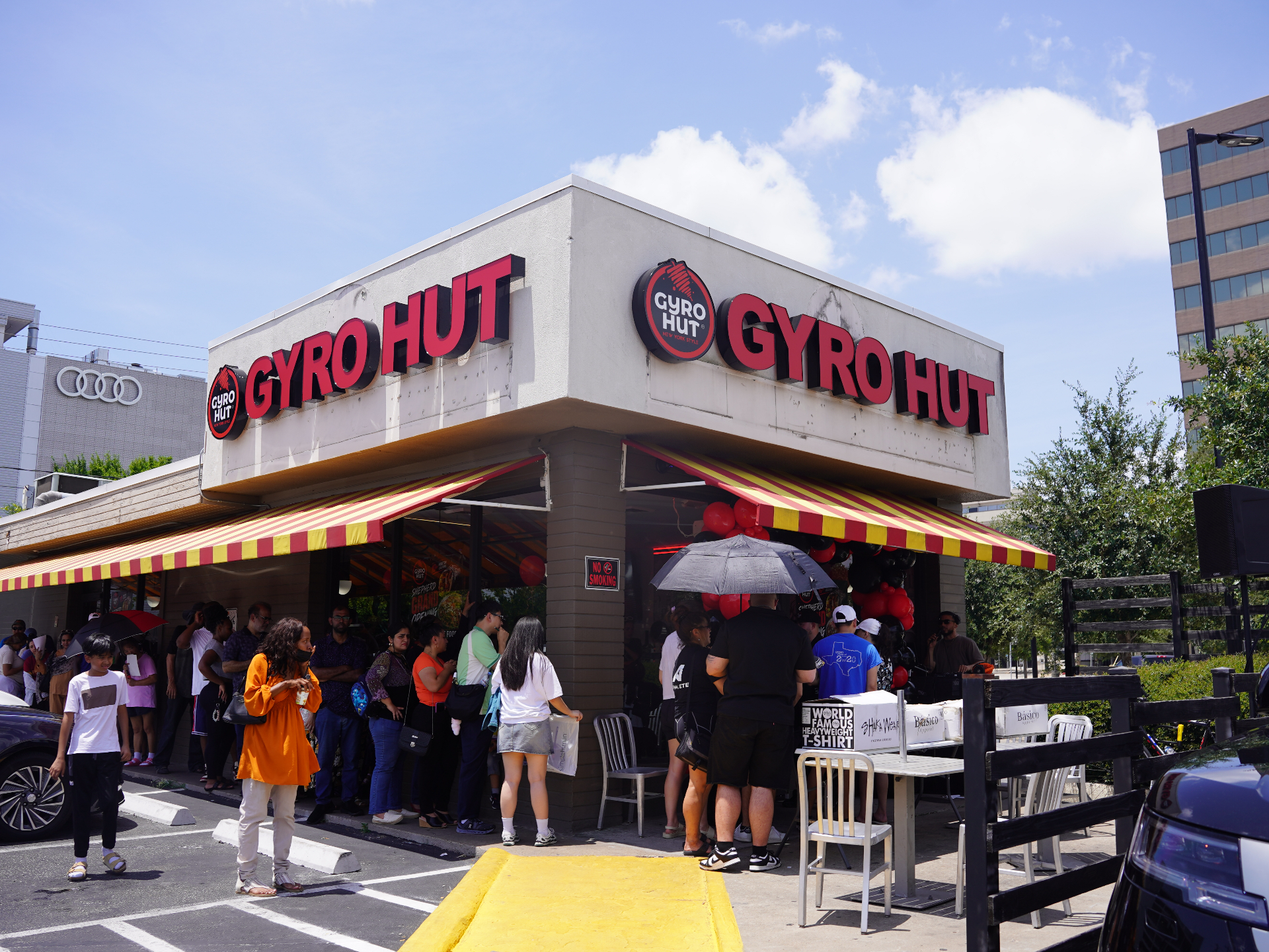 Line of customers outside a busy Gyro Hut location